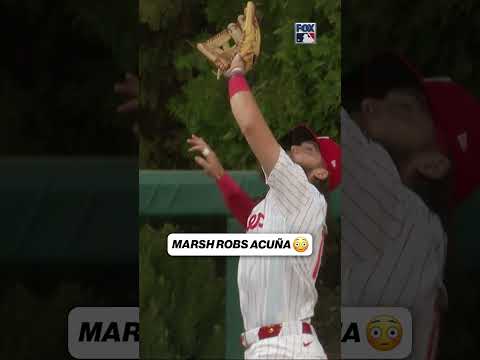 On the first pitch Brandon Marsh robs Ronald Acuña Jr. 🤯 #robbed #mlb #acuna #phillies #marsh