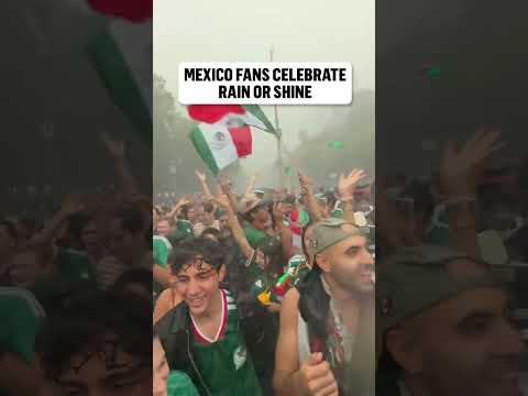 The weather won’t stop the Mexico fans from celebrating their opening 3 points